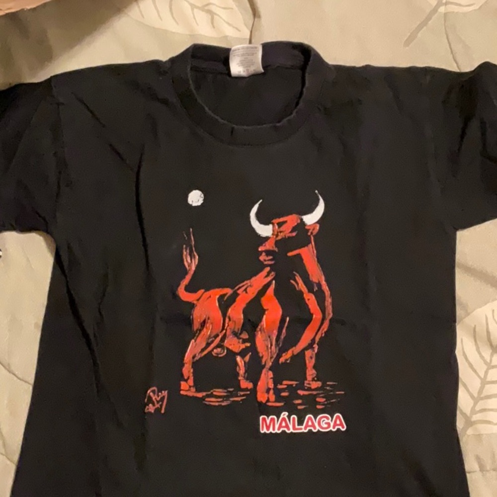 Kids B&C Collection black Malaga shirt. Size 9/11.